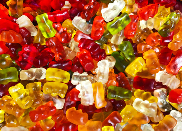 istock Colorful gummy bears background. Gelatin dessert 1129667533