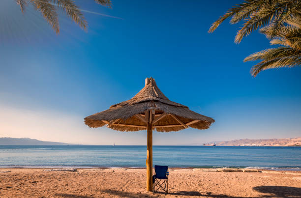 istock Morning at a public beach in Eilat, Israel 1129667851