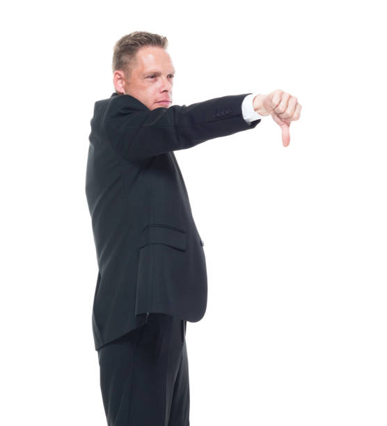 istock Businessman is showing thumbs down 1129669096