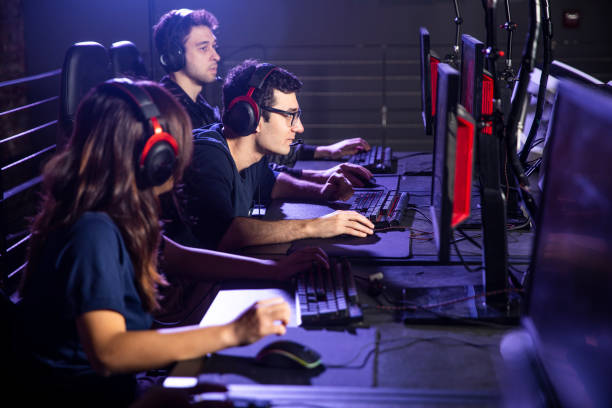istock Diverse group of students playing esports 1129669107