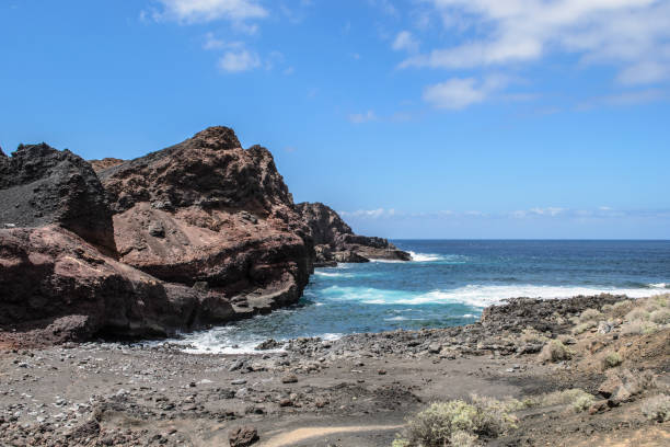View of rocky coastline near Punto de Teno, Tenerife, Canary Islands View of rocky coastline near Punto de Teno, Tenerife, Canary Islands punto stock pictures, royalty-free photos & images