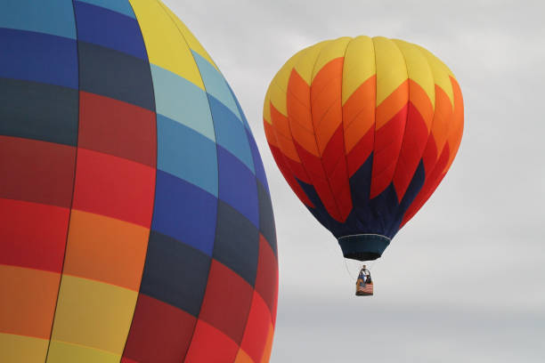 Hot air balloons inflate during a balloon festival in Indianola, Iowa.