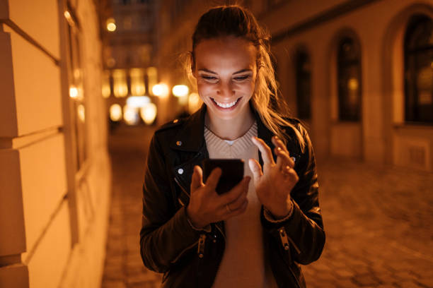 istock Female looking at the mobile phone 1129676596