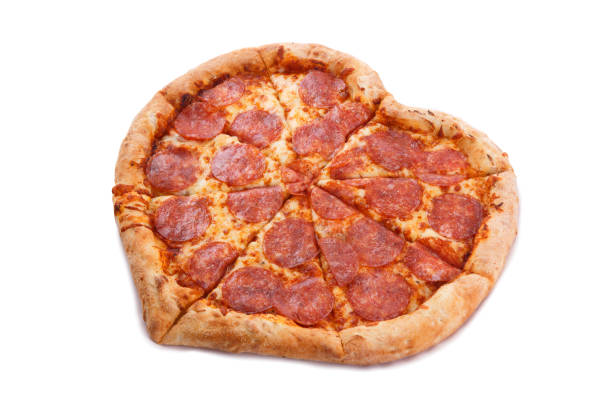 istock Pizza Pepperoni Heart shape with mozzarella cheese 1129676990