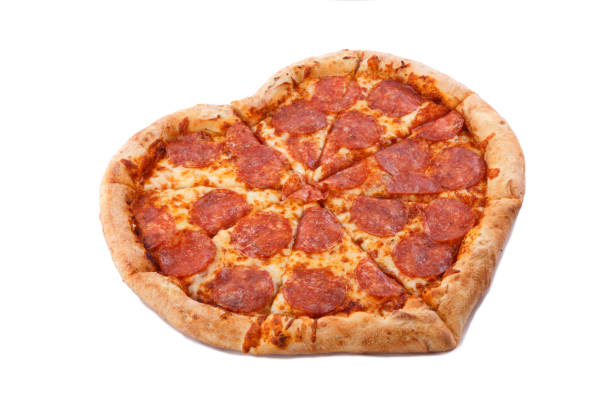 istock Pizza Pepperoni Heart shape with mozzarella cheese 1129676991
