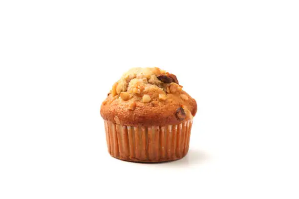 Photo of nuts cupcake muffin isolated on white background