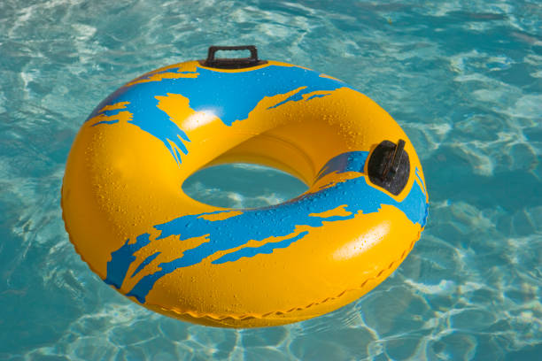 istock Tube floating in swimming pool 1129679150