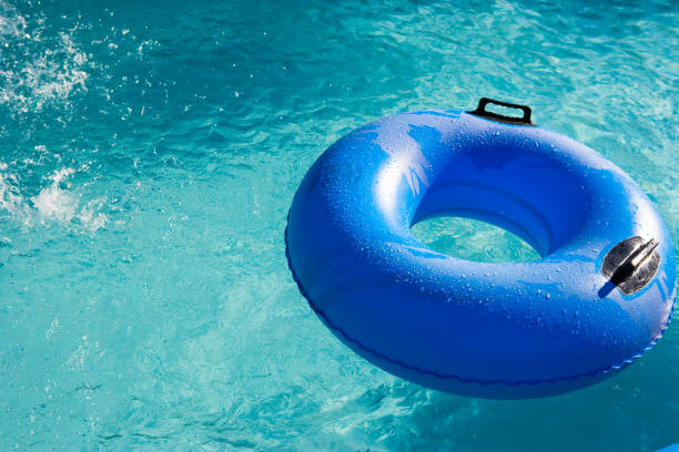 istock Tube floating in swimming pool 1129679154