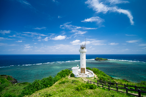 Lighthouse on Ishigaki Island and East China Sea in the background on a sunny day in summer.