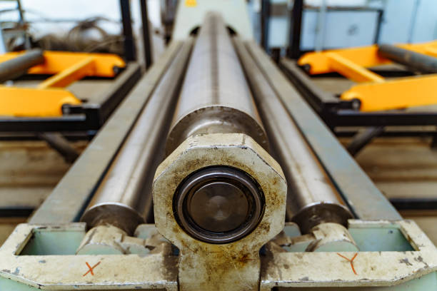 istock Steel metal cutting machine by CNC lathe in workshop. 1129683604