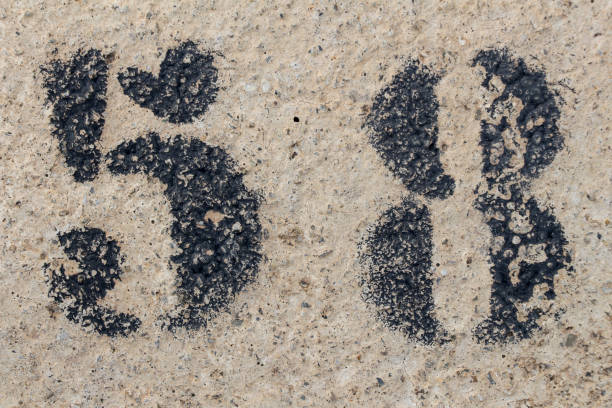 istock number fifty eight painted stencil on concrete wall 1129683628