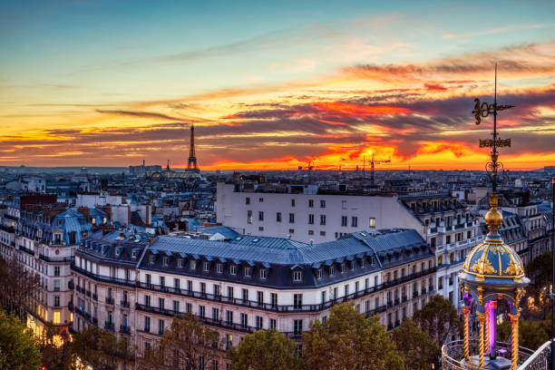 istock Aerial view of Illuminated Paris at Dusk with Eiffel Tower 1129685739