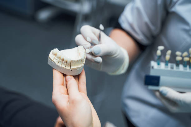istock Dental instruments and dental jaw model, close up view 1129687985