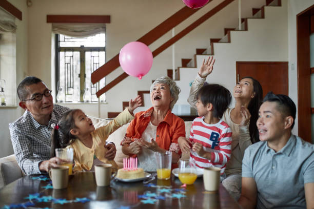 istock Multi-generation family enjoying birthday party 1129688964