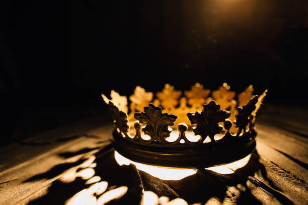 istock Beautiful crown against black background. Game of Thrones. 1129691916