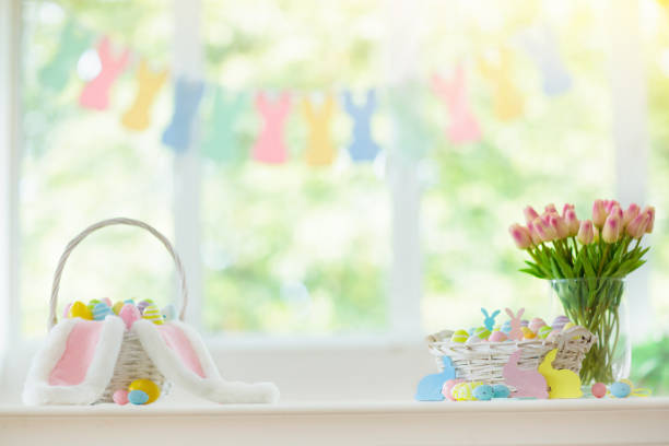 istock Easter home decoration. Eggs basket and bunny. 1129698446