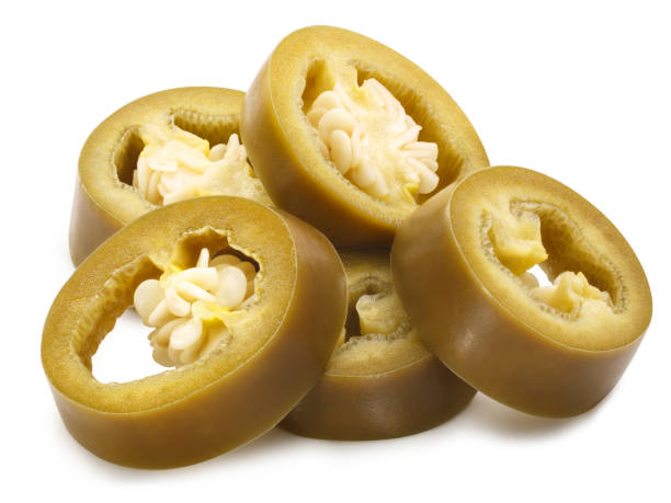 istock Pickled jalapeno rings pile, paths 1129699981