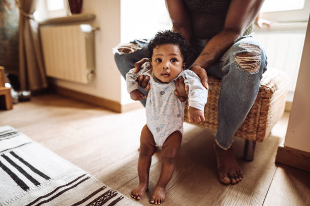 istock african family have fun in the sofa 1129701004
