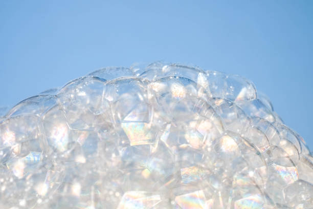 istock Close-Up Of Bubbles Against Blue Background 1129703370