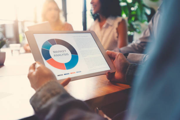 istock Group of people meeting with technology. 1129703395