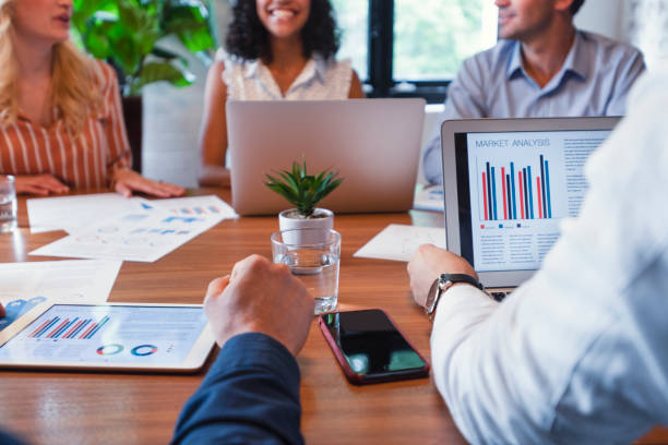 istock Group of people meeting with technology. 1129703414