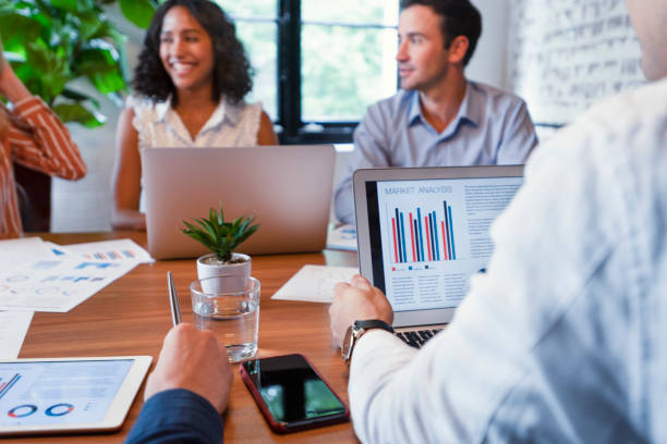 istock Group of people meeting with technology. 1129703416