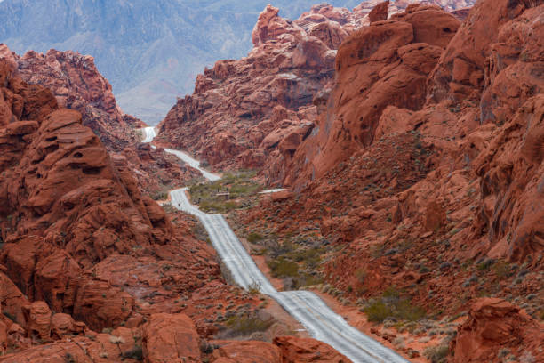 istock Empty Desert Road on Red Rock Canyon after storm 1129710458