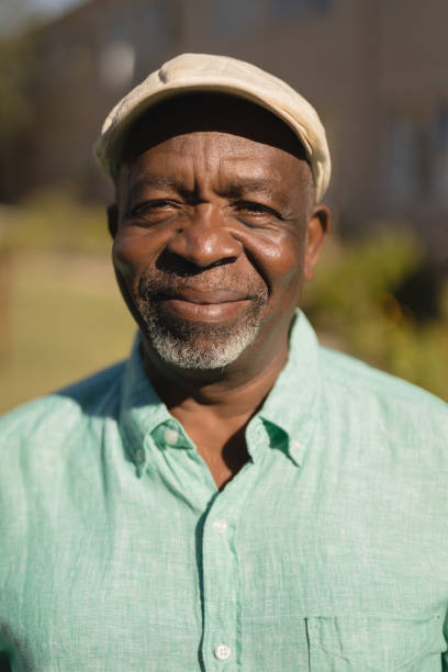 istock Senior man standing in the nursing park 1129710994