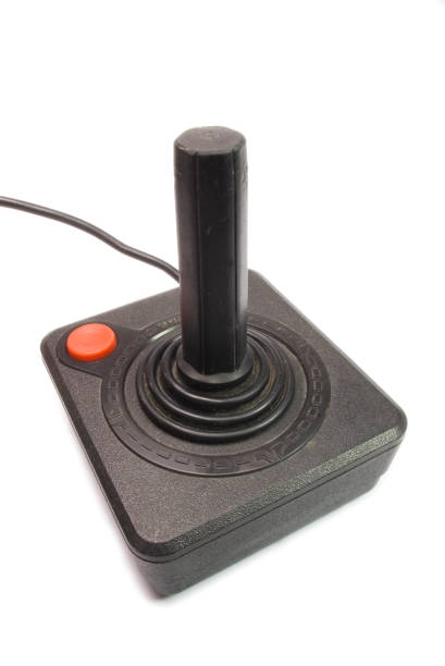 istock vintage joystick with red boton on white background 1129714285