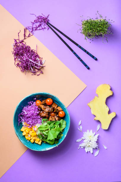 istock Asian Poke bowl with rice, meat, beef and ingredients. 1129715065