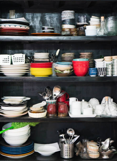 istock wooden shelf with plates and bowls 1129715673