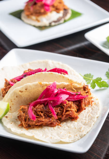 istock Tacos de Cochinita Pibil (puller pork Mexican style taco) 1129717434