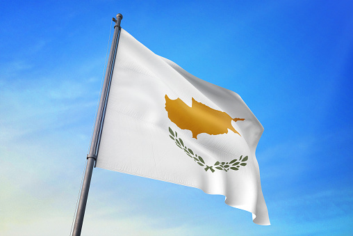 Cyprus flag waving in the blue sky in the wind