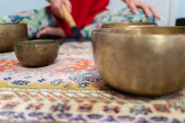 istock Tibetan singing bells or bowl. Bright color. Relaxing music. 1129718385