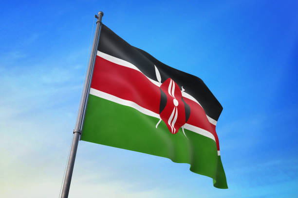 istock Kenya flag waving in the blue sky 1129718541