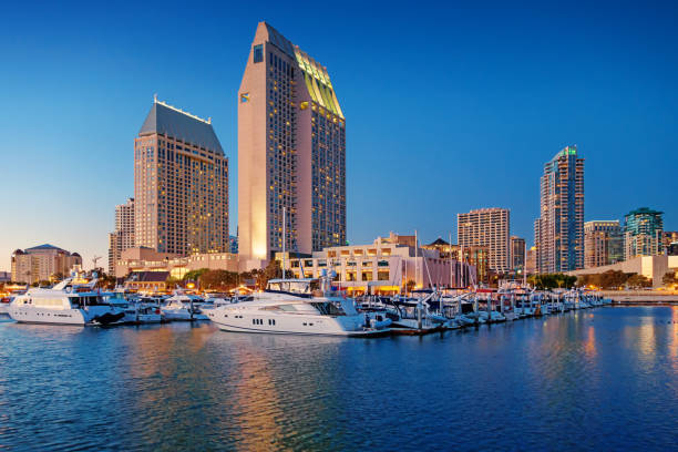 Marina and waterfront in downtown San Diego California USA Marina and waterfront in downtown San Diego California USA illuminated at twilight blue hour. blue hour twilight photos stock pictures, royalty-free photos & images