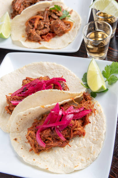 istock Tacos de Cochinita Pibil (puller pork Mexican style taco) 1129718720