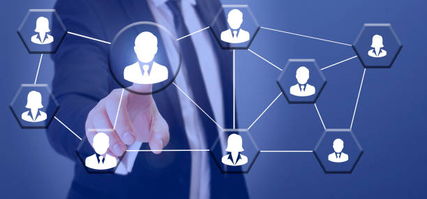istock businessman choosing staff with his finger on transparent screen 1129719915
