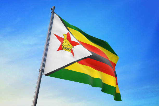 istock Zimbabwe flag waving on the blue sky 3D illustration 1129720464