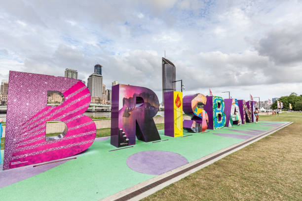 Brisbane, Australia - January 9 2019: Kids playing at the famous Brisbane sign