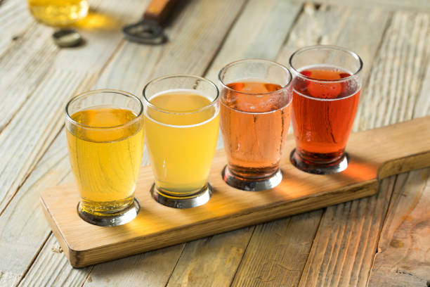 Refreshing Hard Cider Flight Refreshing Hard Cider Flight of Beers to Drink india pale ale photos stock pictures, royalty-free photos & images