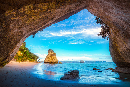 view from the cave at cathedral cove beach,coromandel,new zealand
