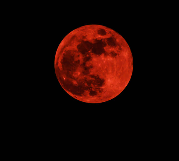 istock Red moon real / full blood moon on black sky dark background - selective focus 1129729443