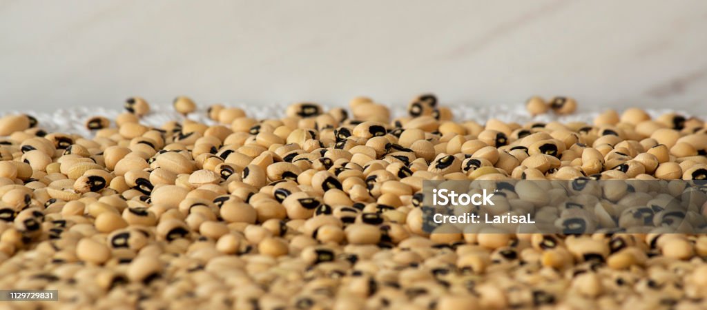 Lima beans, or lunar beans (lat. Phaseolus lunatus). White beans. Source of carbohydrates, contains little protein. Add to your diet diet, veganism. Background image, selective focus. Above Stock Photo
