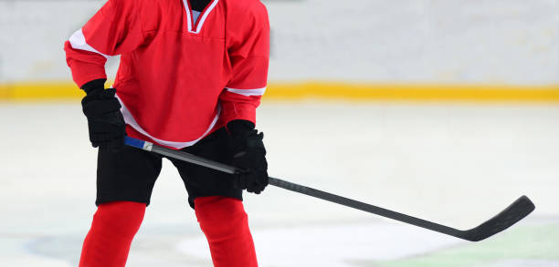 istock Midsection Of Man Playing Ice Hockey 1129732322