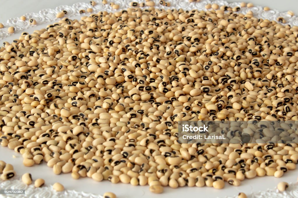 Lima beans, or lunar beans (lat. Phaseolus lunatus). White beans. Source of carbohydrates, contains little protein. Add to your diet diet, veganism. Background image, selective focus. Above Stock Photo