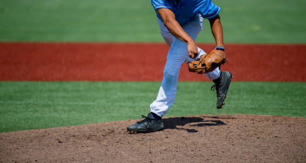 istock Low Section Of Baseball Player Playing On Field 1129733592