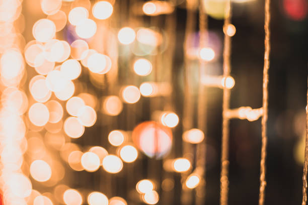 istock Night-Blurred Photo blur bokeh background defocused lights. 1129737008