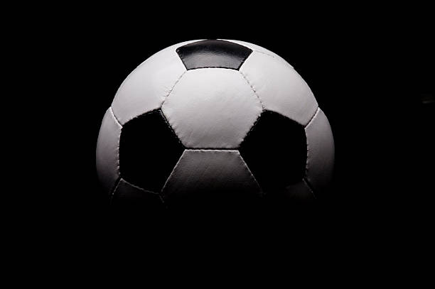 istock Soccer ball on black background 112973898