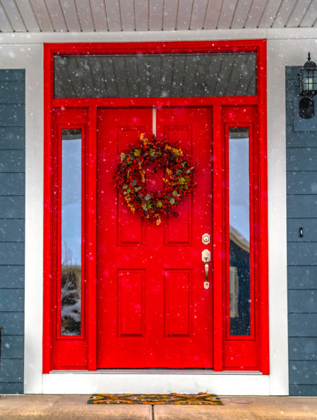 istock Festive front door on a snowy day in Daybreak Utah 1129741634